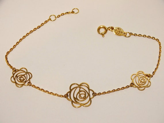 750k or 18k Gold cut-out Rose Design Bracelet. - image 1