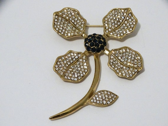 MMA-CN Gold Tone Sparkling Crystals Brooch.