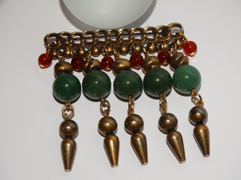 Large Brass With Dangling Geen Jade Bead Brooch.