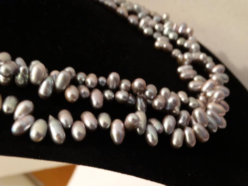 Sterling Silver Stamped Triple Strand Of Gray Freshwater Pearl Necklace. image 3