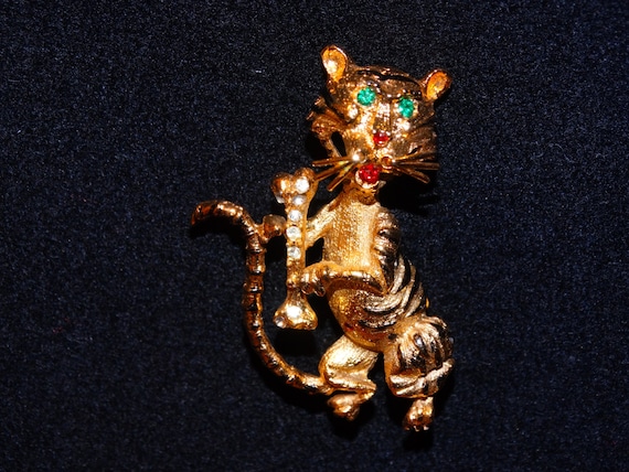 Gold Tone White & Green stones Tiger Brooch.