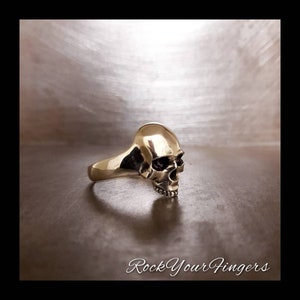 Silver Skull Ring Sterling highly polished suitable both for men and women available in most of the sizes.