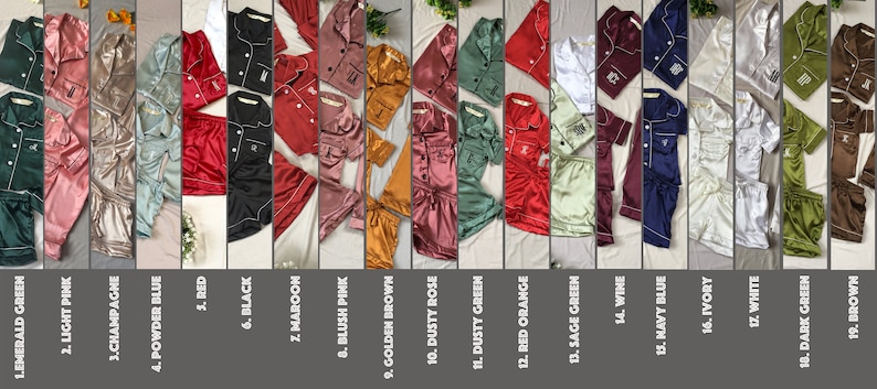 May include: A collection of 18 different colored satin pajamas with a button-up top and shorts. The pajamas are arranged in a row, with each color labeled with a number.