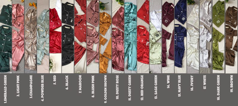 May include: A collection of 19 different color satin pajamas sets. Each set includes a short-sleeved shirt with a button-up closure and matching shorts. The pajamas are available in a variety of colors, including emerald green, light pink, champagne, powder blue, red, black, maroon, blush pink, golden brown, dusty rose, dusty green, red orange, sage green, wine, navy blue, ivory, white, dark green, and brown.