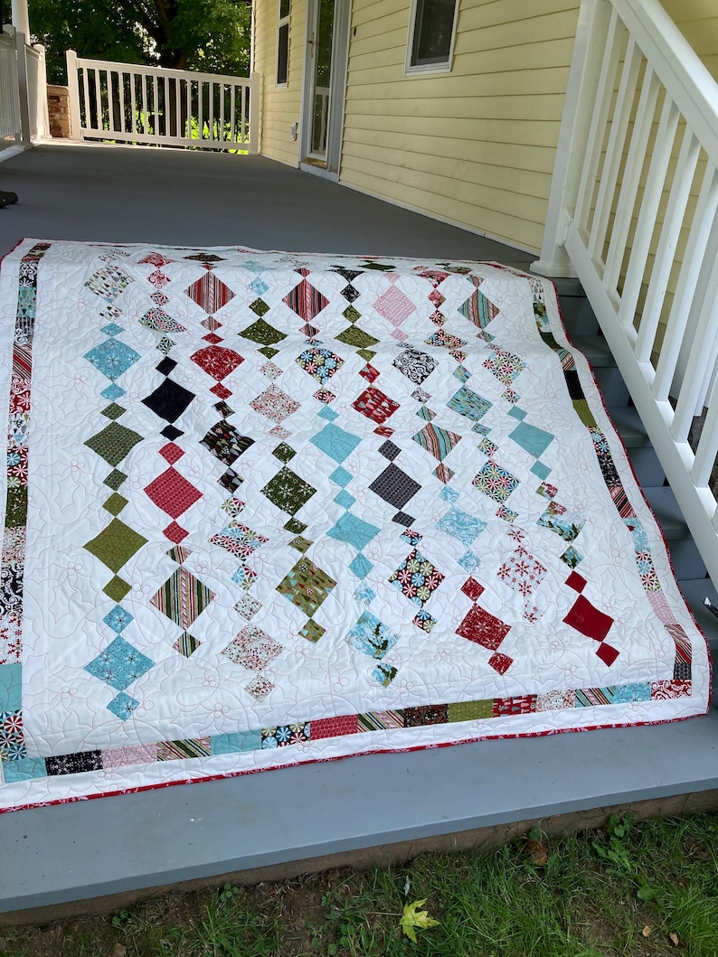 Charm pack christmas quilt