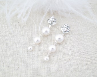 Pearl drop earrings Modern bridal earrings Graduated pearl earrings Crystal earrings Gold wedding earrings Unique emerald cut earrings
