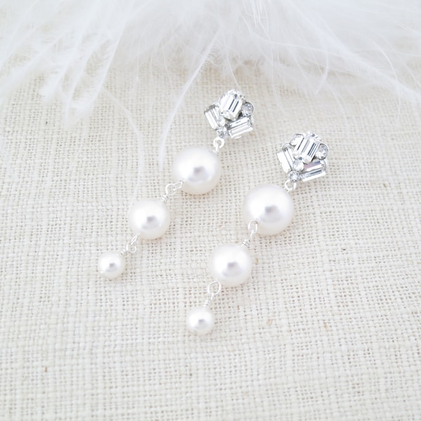 Pearl drop earrings Modern bridal earrings Graduated pearl earrings Crystal earrings Gold wedding earrings Unique emerald cut earrings