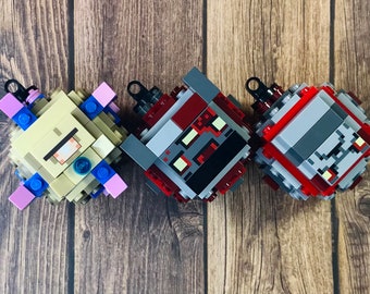 Custom Christmas Ornaments inspired by Minecraft: Redstone Golem, Monstrosity, Elder Guardian, made from LEGO® Bricks