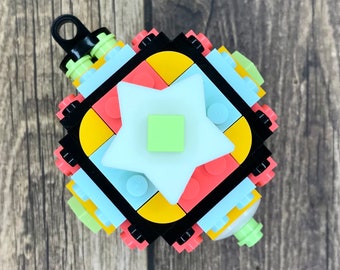 Custom 90s Kid Glow-In-The-Dark Star Christmas Ornament made from LEGO® Bricks