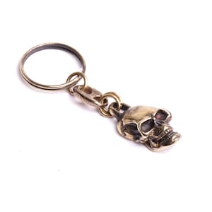 Keyring skull pendant mounted on link coffee beans with ring fastening mark By Mode France.