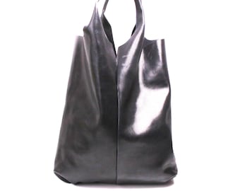 Women's bag leather pouch set leather goods manufacturing By Mode France.