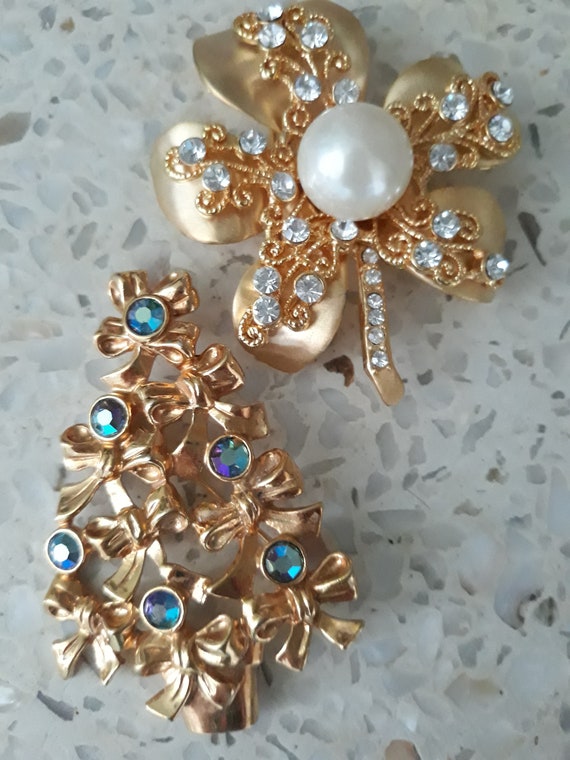 Two Vintage Holiday Brooches
