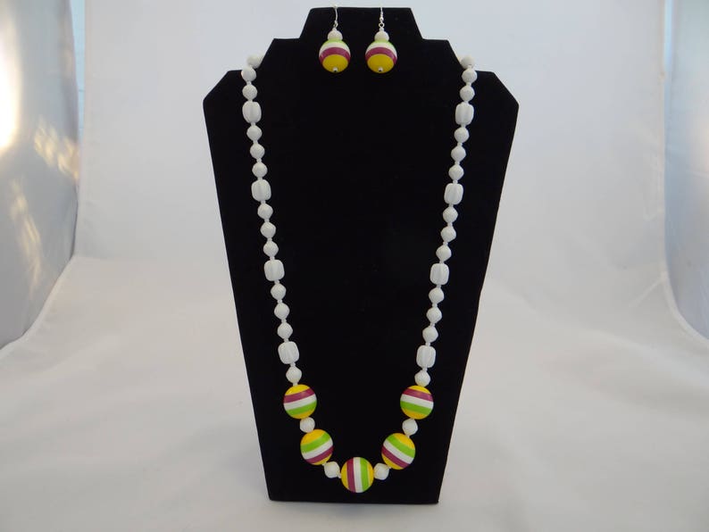 Retro white plastic up-cycled beaded necklace with chunky striped focal beads with matching earrings