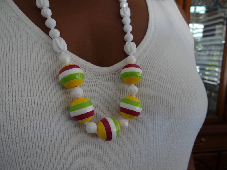 Retro white plastic up-cycled beaded necklace with chunky striped focal beads with matching earrings