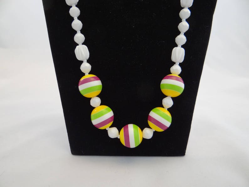 Retro white plastic up-cycled beaded necklace with chunky striped focal beads with matching earrings