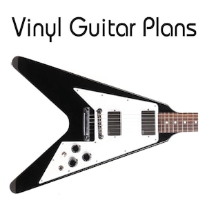 Puede incluir: Un cuerpo de guitarra eléctrica negro en forma de V con un golpeador blanco, dos pastillas humbucker negras, un puente cromado y cuatro perillas de control negras. El texto Vinyl Guitar Plans aparece arriba sobre fondo blanco.