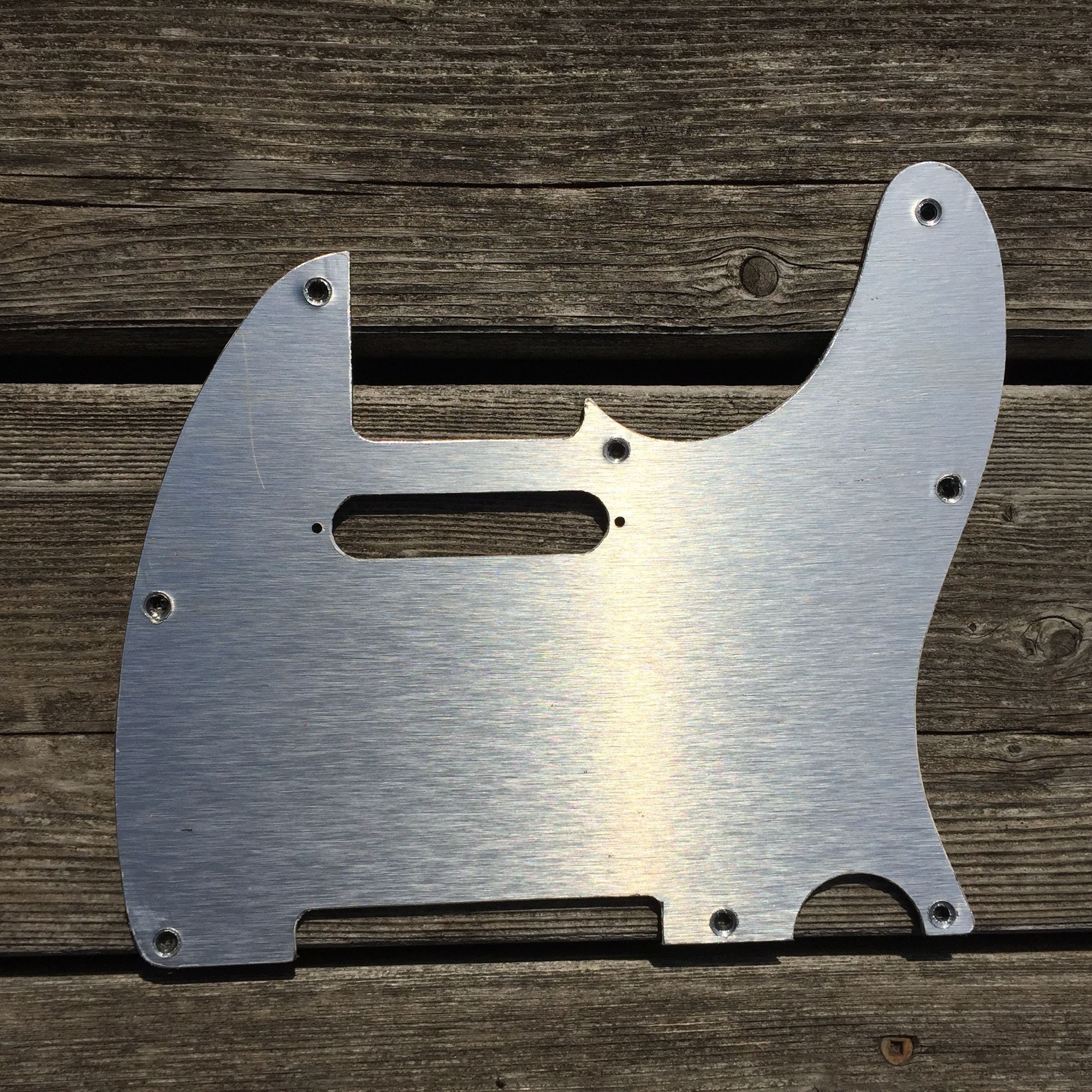 Brushed aluminum Tele pickguards made from an old sign. Etsy