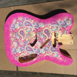 Pink Paisley Telecaster guitar wrap.  Pink burst edge with gloss laminate. Knifeless tape included. No cutting! Ships free