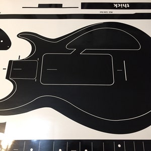 Plantilla de enrutamiento para bajo Gibson Grabber de los años 70, basada en el modelo de 1975. Especificaciones de cuerpo y mástil en vinilo adhesivo recortado para la construcción de bajos. Envío gratuito.