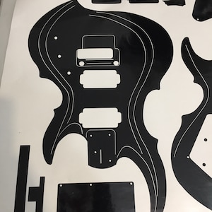 FRXX vinyl guitar routing template. Radical  guitar shape 2014 model w/2 body shapes, pickguard  neck, headstock, plates. Ships Free