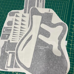 cut vinyl charvel surfcaster guitar template to put on mdf