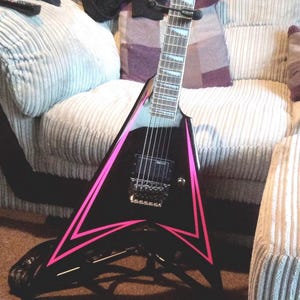 Alexi -200 upgrade graphics kit. Neon Greenie, Neon Pink, Yellow, Black. LTD guitar stripes front , back and skulls. Ships free