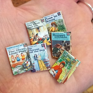 1.12 scale dollhouse set of six Lady bird books with aged blank turnable pages inside.