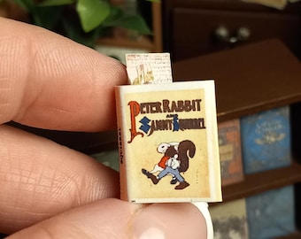 Peter rabbit and Sammy squirrel illustrated 1:12 scale dollhouse miniature vintage book. A loose bookmark and post cards are also included.