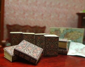 Tudor rose encyclopedia  set of 8 dolls house miniature books in 1:12 scale that open with blank  pages inside.A loose bookmark included.