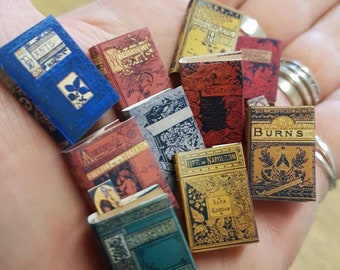 Victorian replica set of 10 dolls house miniature books in 1:12 scale that open with blank  pages inside.