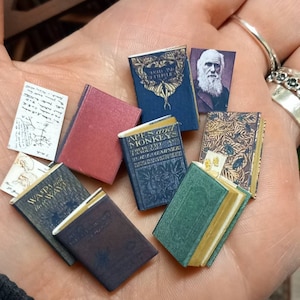 Charles Darwin antique replica book set in 1.12 scale miniature.