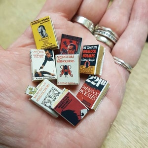 Sherlock Holmes vintage set of 8 dolls house miniature books in 1:12 scale that open with blank  pages inside.