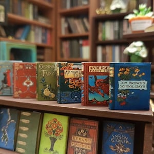 Set of 8 antique novels in 1:12 scale dollhouse miniature.