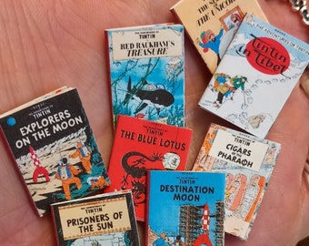 1:12 dollhouse miniature vintage TINTIN bookset of 8 . Each book has aged blank turnable pages inside.