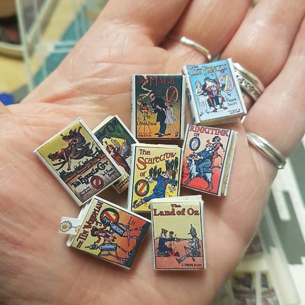 Oz collection of 1:12 scale dollhouse miniature vintage books with aged turnable blank pages. A loose bookmark is also included.