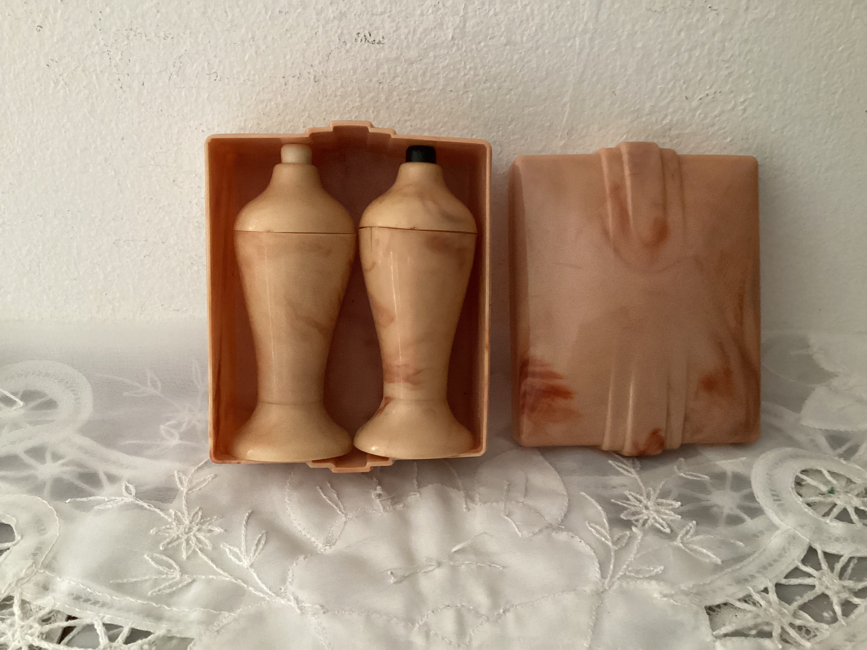 * Vintage Carvanite PINK Plastic Push Button Salt and Pepper Shakers.