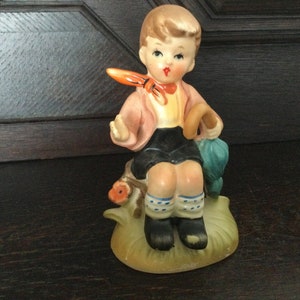 Vintage JAPAN BOY With UMBRELLA Sitting On A Stump  Marked on Bottom