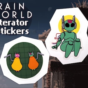 May include: Rain World Iterator stickers. The image features two stickers with a white border. One sticker shows a green robot-like figure with a yellow circle behind it. The other sticker has two figures with yellow and orange cloaks.
