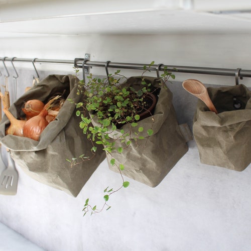 Hanging baskets, kitchen storage, wall storage, washable paper bags, wall planters. wall organizer