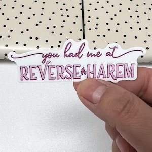 May include: White sticker with pink text that reads "You had me at Reverse Harem".