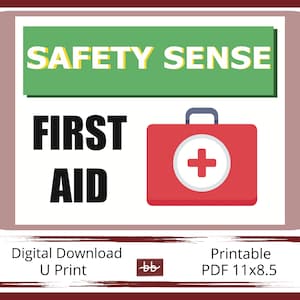 May include: A printable poster with a green banner that says "SAFETY SENSE" and a red first aid kit with a white cross. The text "FIRST AID" is in black letters below the banner. The poster is framed with a brown border.