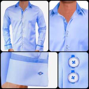 May include: A light blue dress shirt with a contrasting light blue collar and cuffs. The shirt features a button-down front and decorative buttons. The cuffs have a silver cufflink. The shirt is made of a smooth, possibly satin-like fabric.