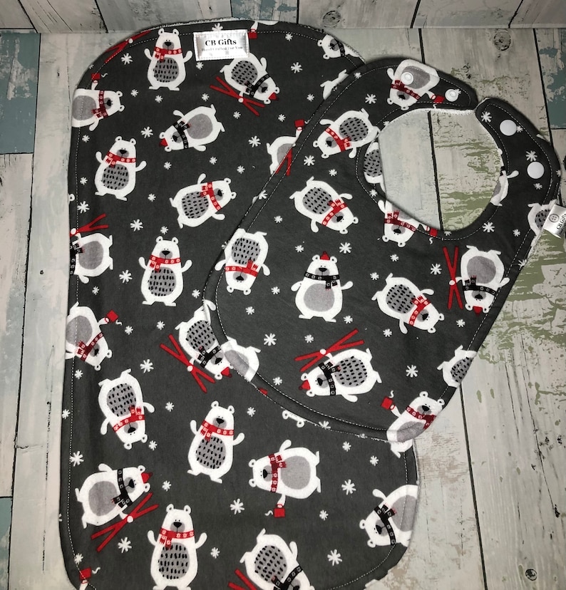 Skiing bear adjustable bib and burp cloth set