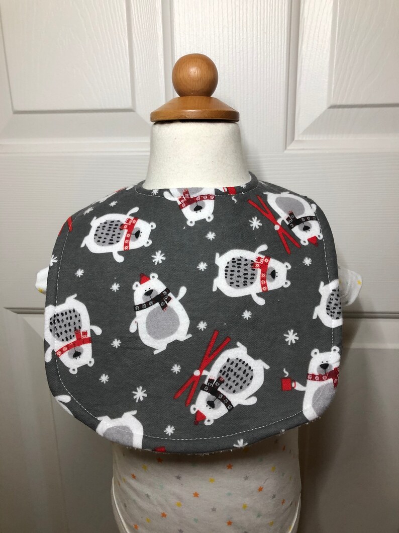 Skiing bear adjustable bib and burp cloth set