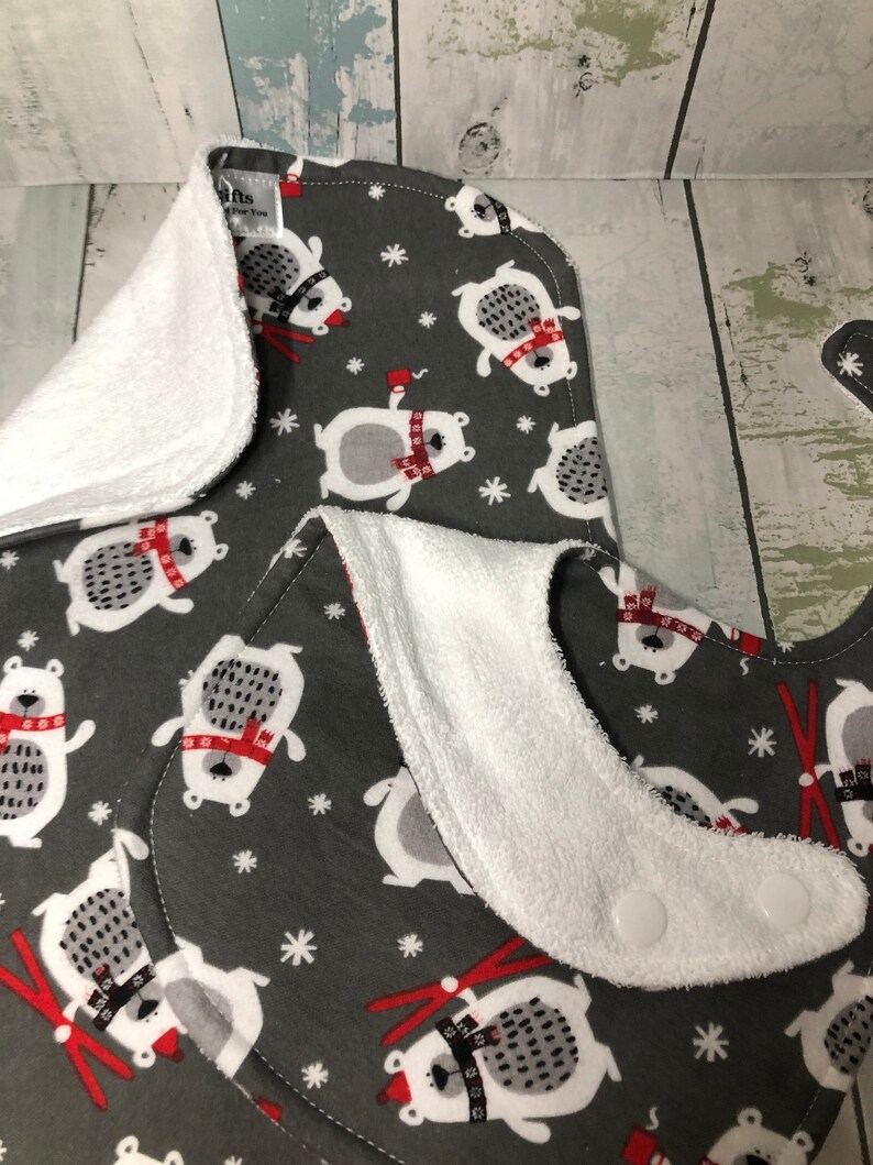 Skiing bear adjustable bib and burp cloth set