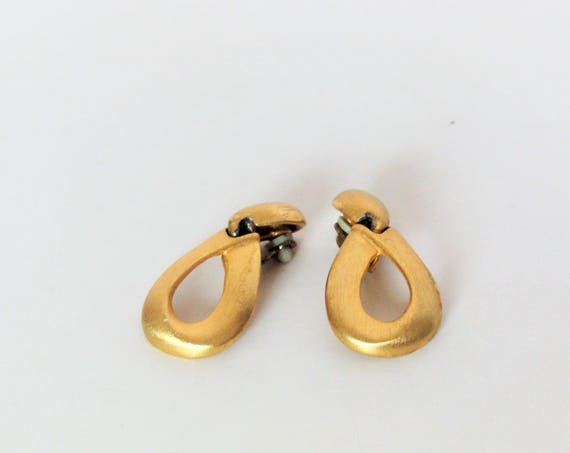 A Pair of Mid-Century Gold Tone Teardrop Clip on Earrings