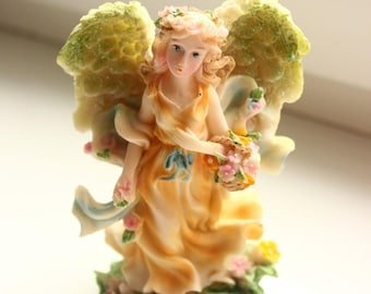 Figurine statuette ceramic angel Girl with flowers souvenir
