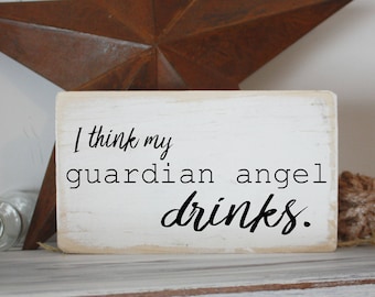 I think my guardian angel drinks / mini quote block