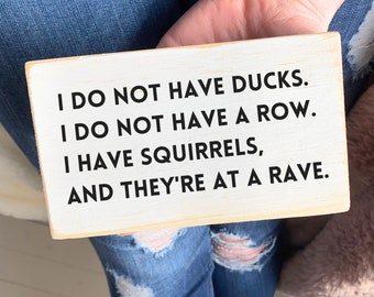 I do not have ducks.  I do not have a row.  I have squirrels,  and they're at a rave / Sarcastic wood plaque / Funny Desk Sign / Office Gift