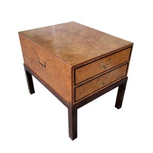 May include: A set of three ceramic mugs with a speckled, matte finish. The mugs are in shades of cream, light gray, and dark gray. Each mug has a simple, minimalist design, perfect for coffee or tea.